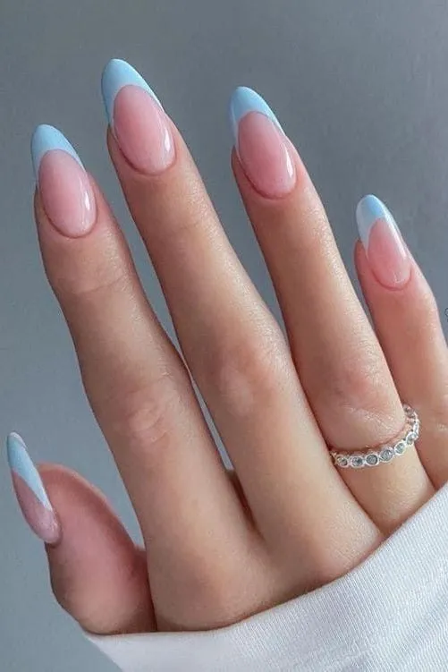 Female Hand with Pastel Blue Nail and with Beautiful Stylish Ring on  Finger. Close Up Photo. Nail Polish Stock Image - Image of glamour, gloss:  252657961