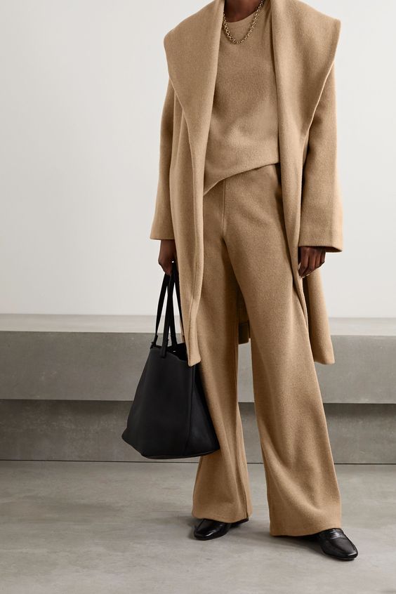 woman in top, sweater, and pants for Camel Outfits