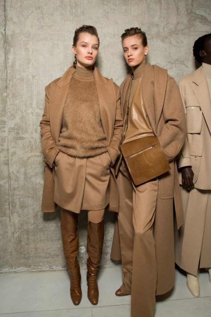 two women in Camel Outfits