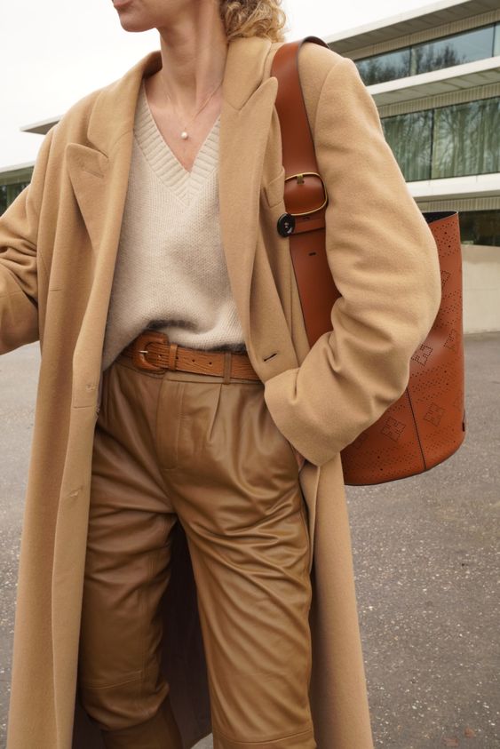 woman in knitted top, sweater, and leather pants for Camel Outfits