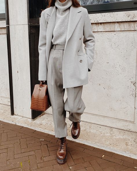 woman in grey out with leather bag and shoes