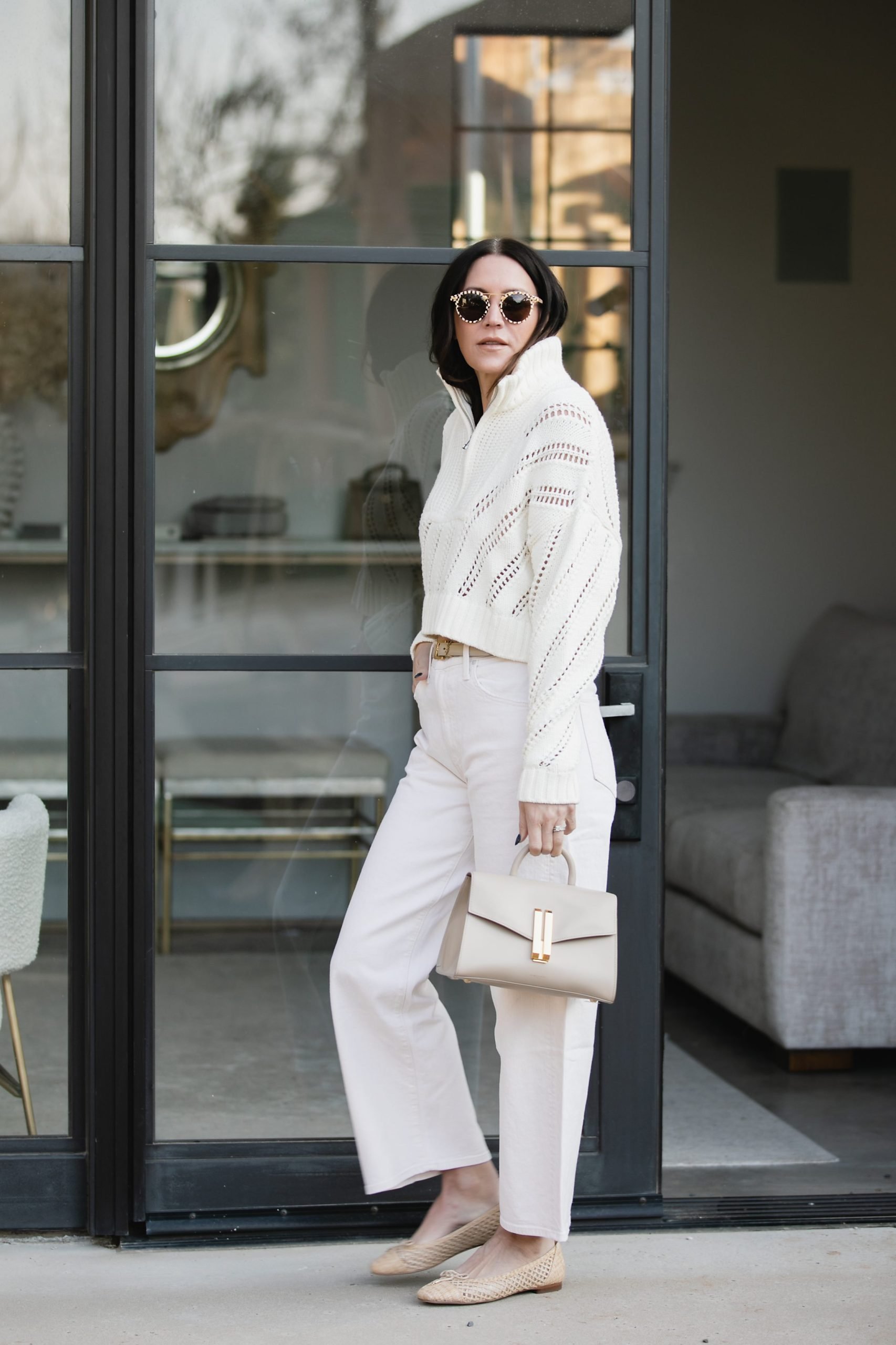 Cream half-zip sweater and jeans outfit idea