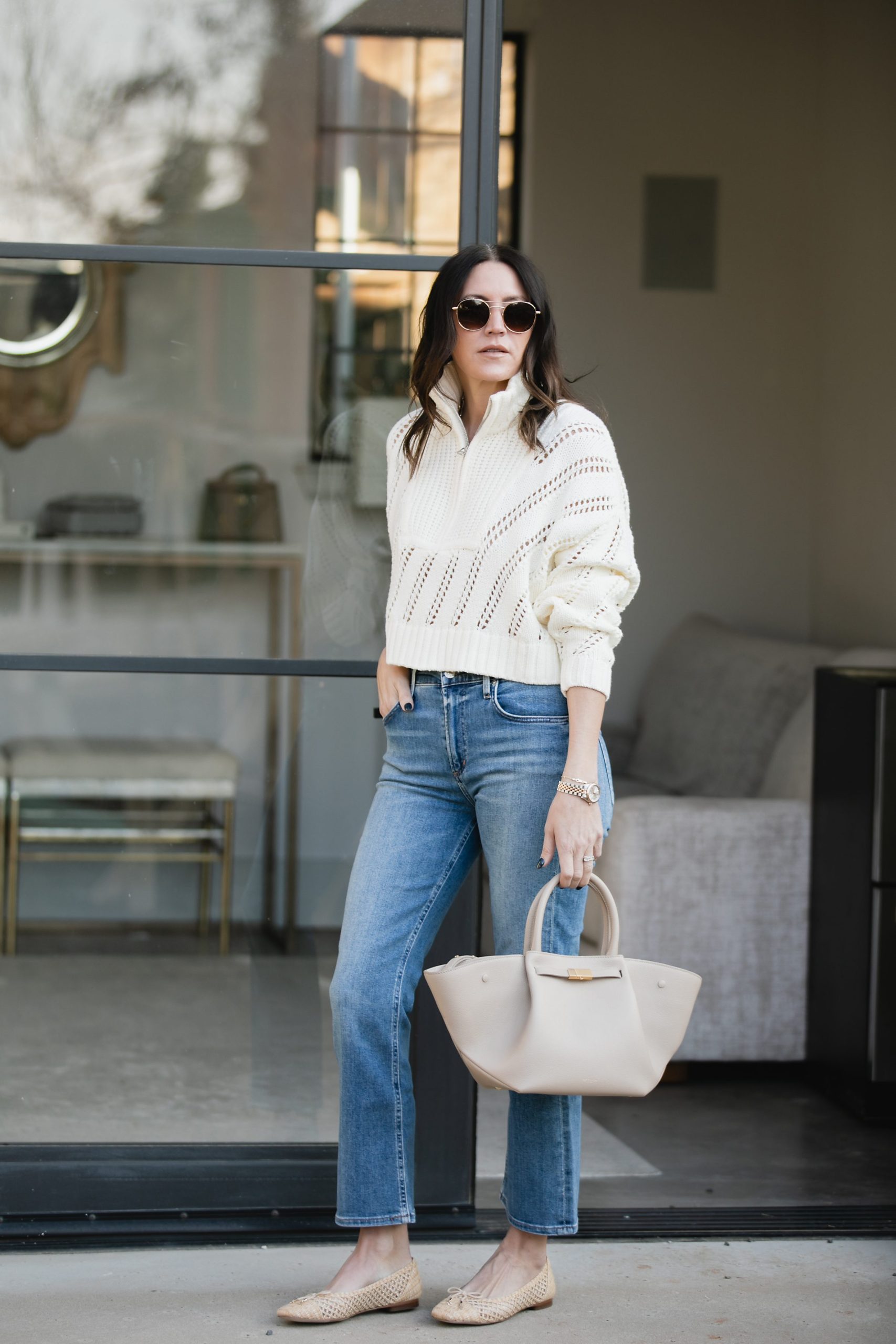 Cream half-zip sweater and jeans outfit idea