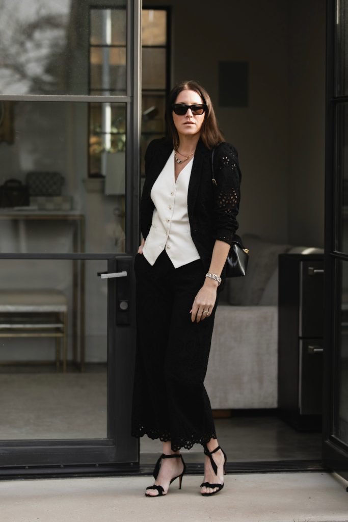white vest + black eyelet skirt + top outfit