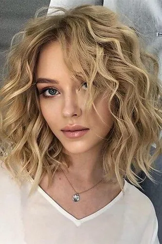 Curly Shoulder Length hairstyle