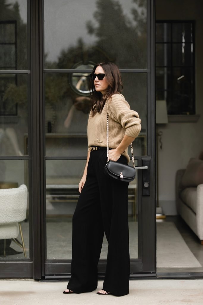 Make Baggy Pants Look Good with Black wide leg Trousers and sweater outfit by The Gray Details Blogger  Amanda Baker
