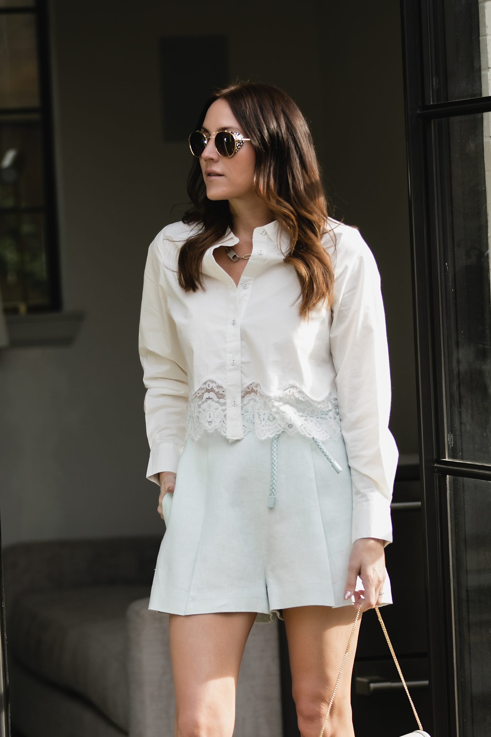 lace blouse and shorts outfit