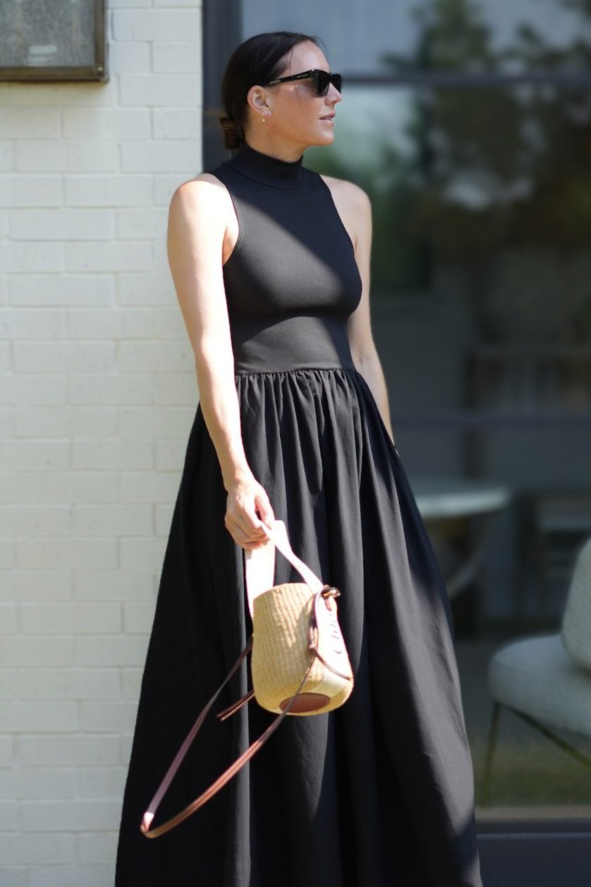 black dress with sunglasses