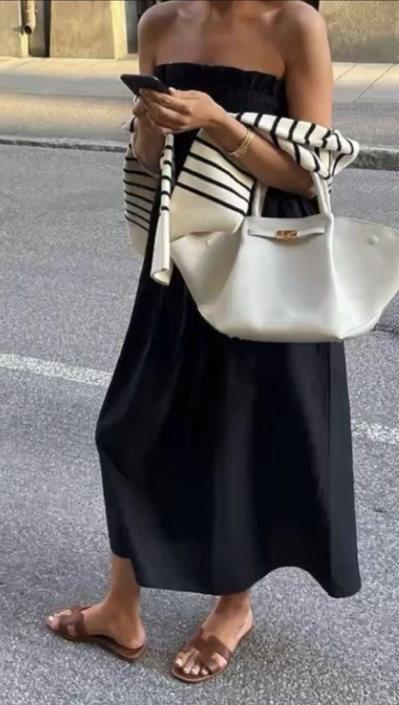 Black Dress and Striped Sweater in paris