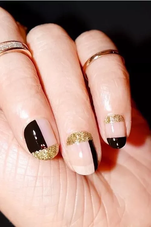 black and gold New Years Eve Nails