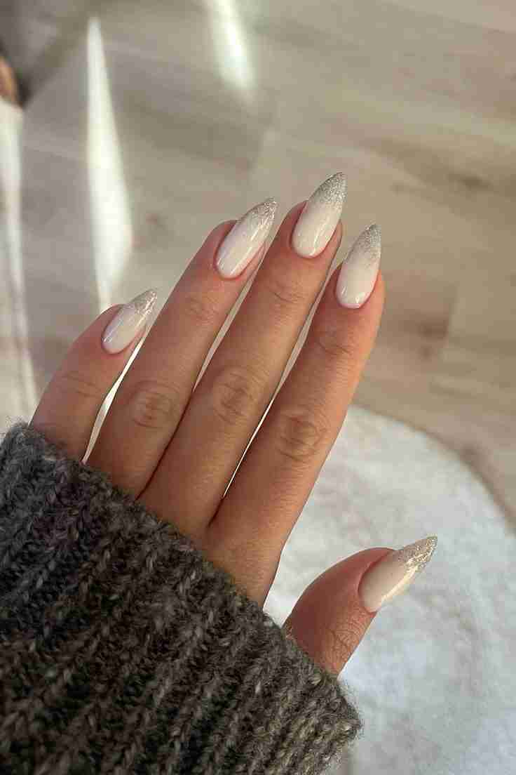 https://thegraydetails.com/wp-content/uploads/2024/12/winter-white-nails-silver-white-edited.jpeg?utm_source=chatgpt.com