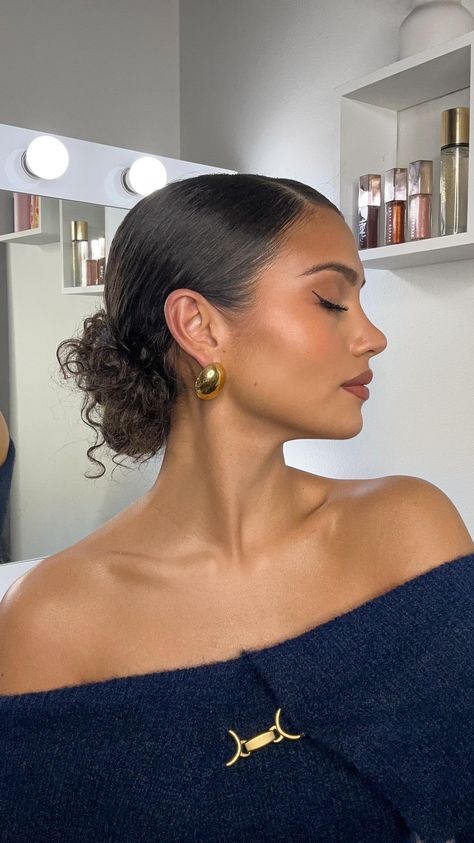 Slick Back Bun with Curly Hair