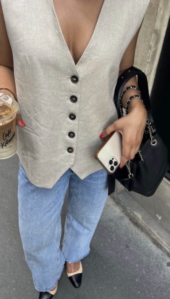 Pinterest Worthy Spring Weekend Outfits - jeans, vest, and black bag