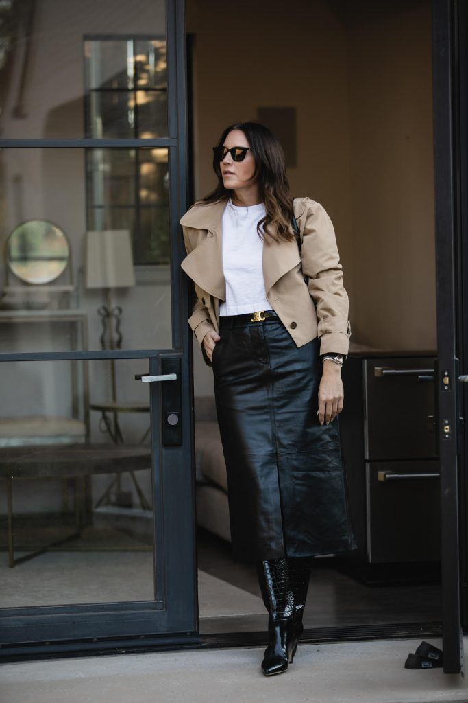 Graphic T-Shirt with a Leather Skirt and Cropped Trench