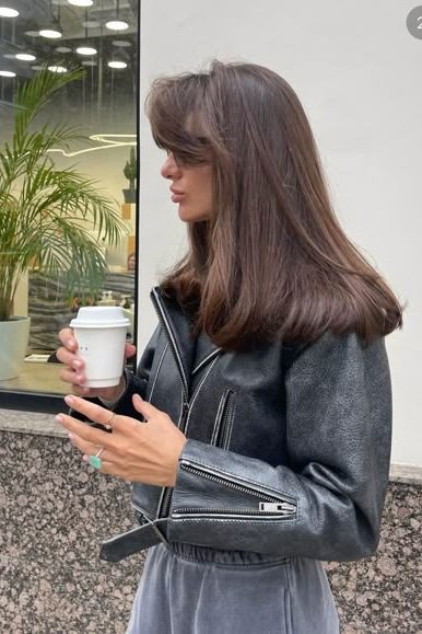 Soft Curtain Bangs with a Blowout
