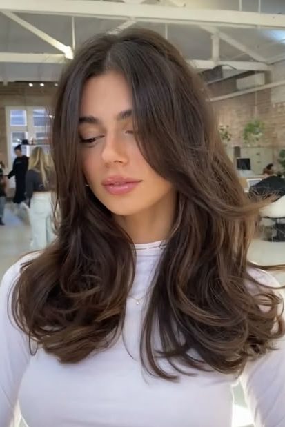 Soft Curtain Bangs with a Blowout