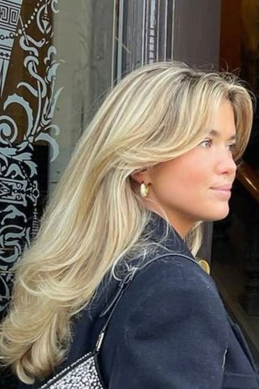 Soft Curtain Bangs with a Blowout