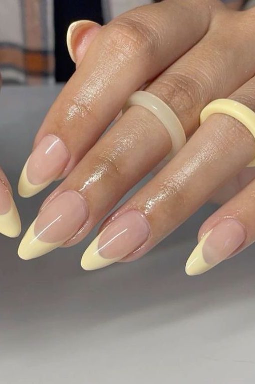 Almond French tip Butter Yellow Nails