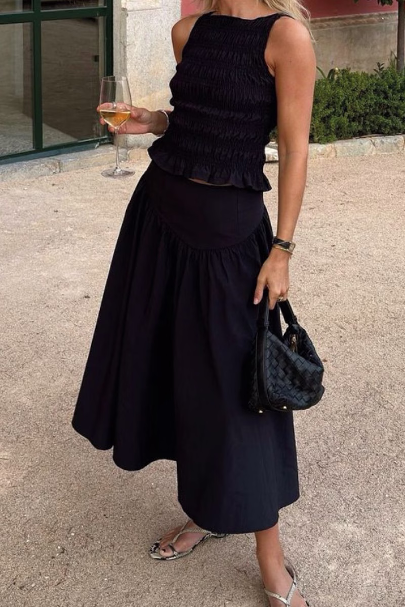 what to wear in italy in the summer - black smocked top and midi skirt set